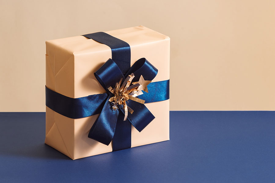 christmas-birthday-box-isolated-blue-background